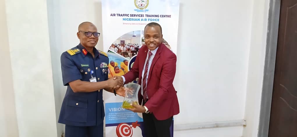 Award presentation at an air traffic services training centre